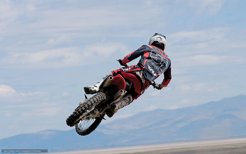 Motocross Rider in Mid-air — Blue, Dynamic, Afternoon, Photograph, Motorcycle, Mountains