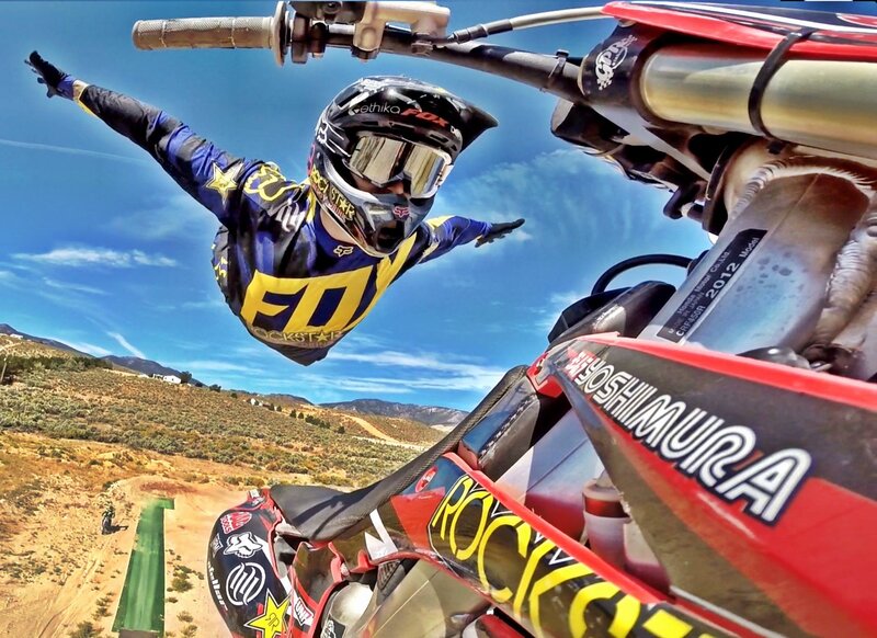 Motocross Rider in Mid-air — Blue, Dynamic, Afternoon, Photograph