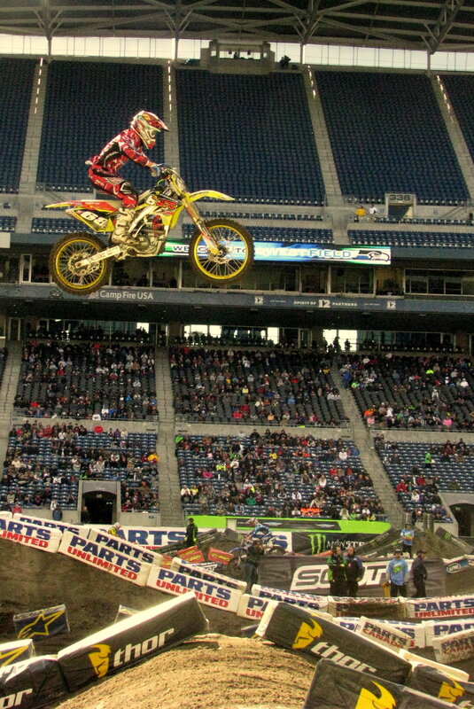 Motocross Rider in Mid-air — Blue, Dynamic, Photograph, Stadium