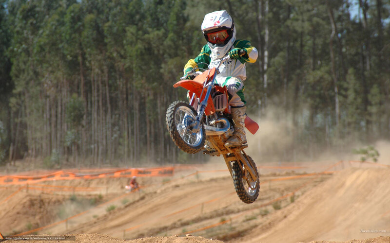 Motocross Rider in Mid-air — Brown