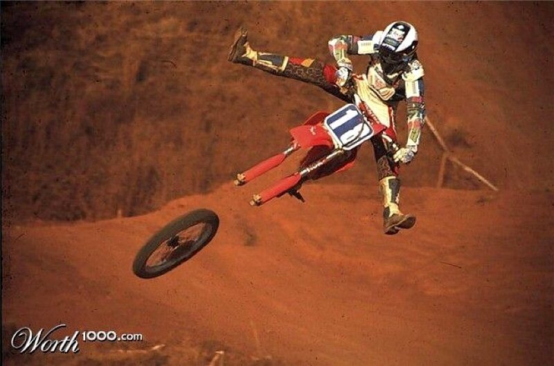 Motocross rider in mid-air crash