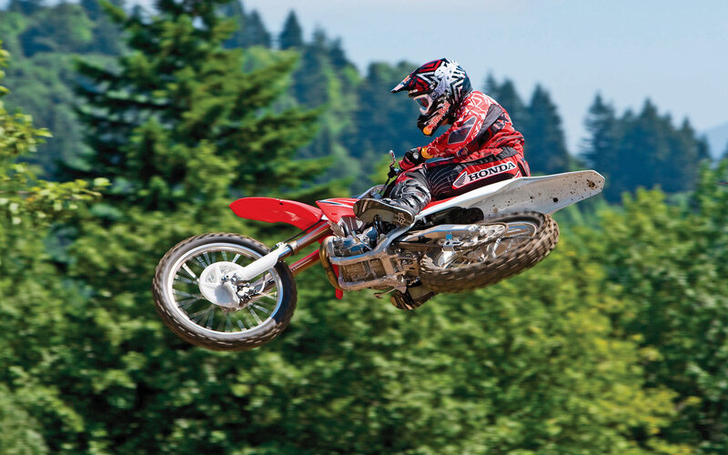Motocross Rider in Mid-air — Green