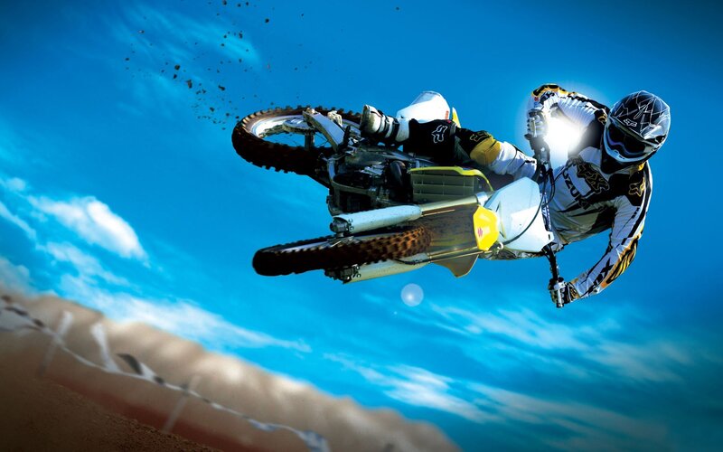 Motocross rider in mid-air jump