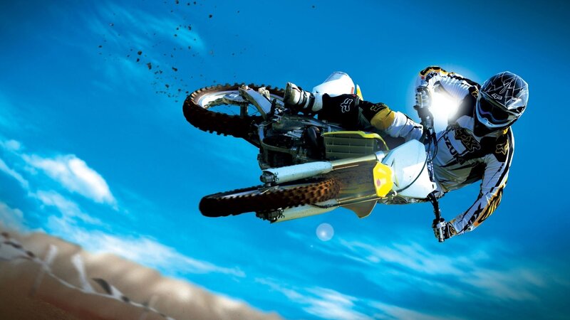 Motocross rider in mid-air jump