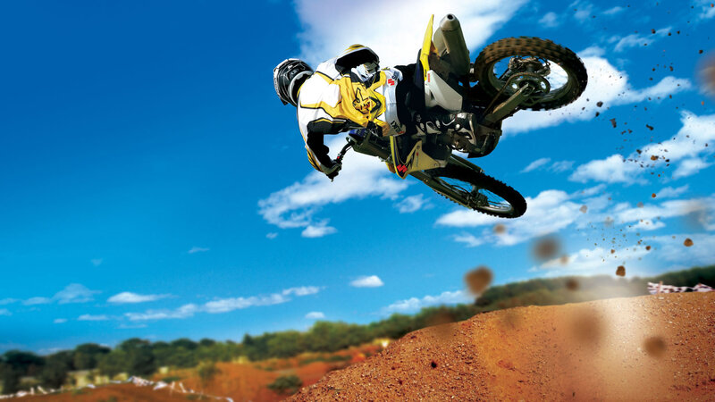 Motocross rider in mid-air jump
