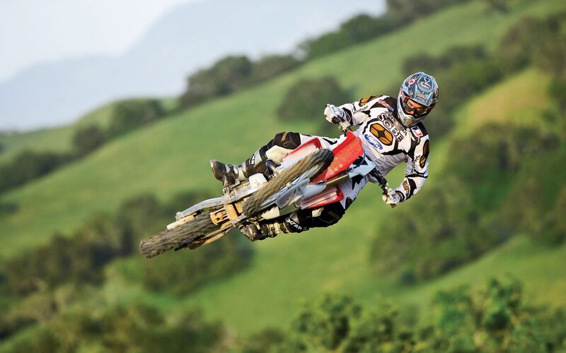 Motocross rider in mid-air jump