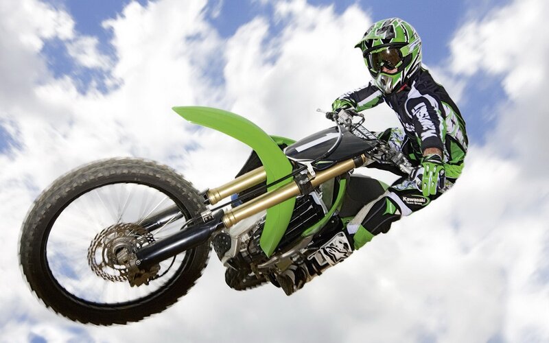 Motocross rider in mid-air jump