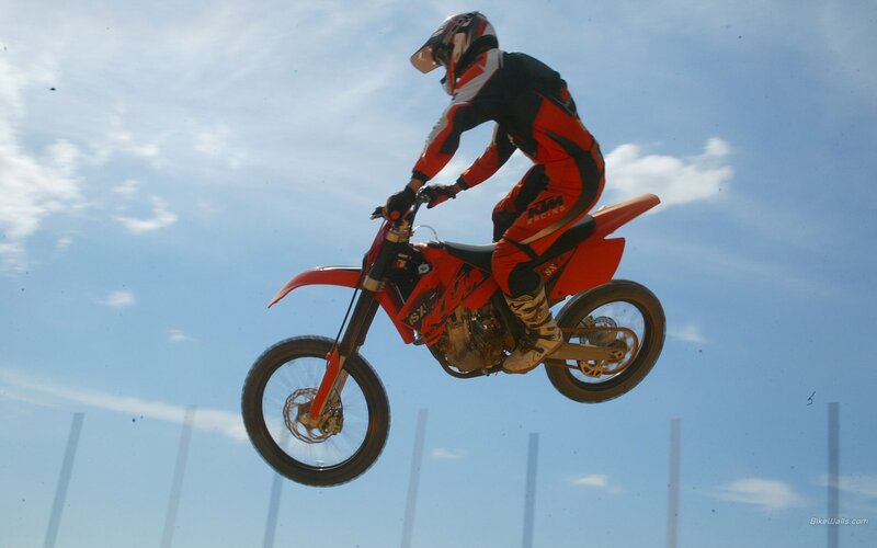 Motocross rider in mid-air jump