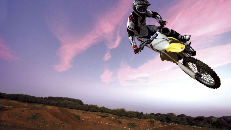 Motocross rider in mid-air jump