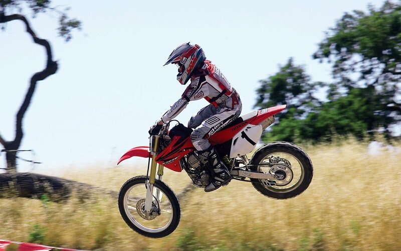 Motocross rider in mid-air jump