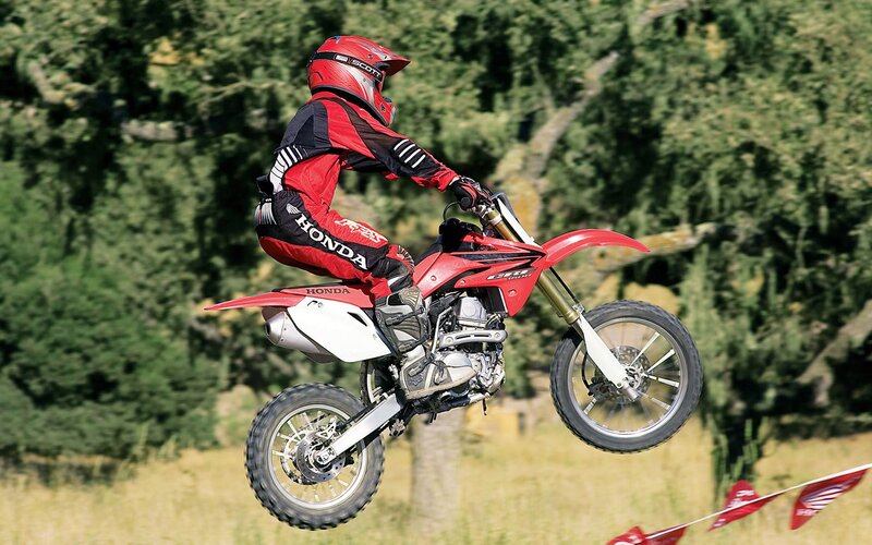 Motocross rider in mid-air jump