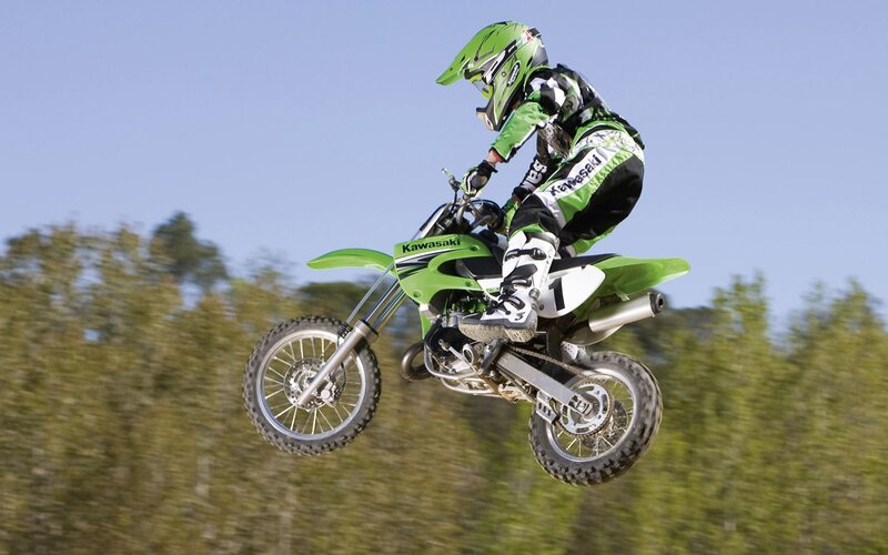 Motocross rider in mid-air jump