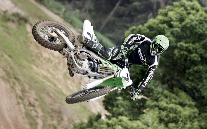 Motocross rider in mid-air jump