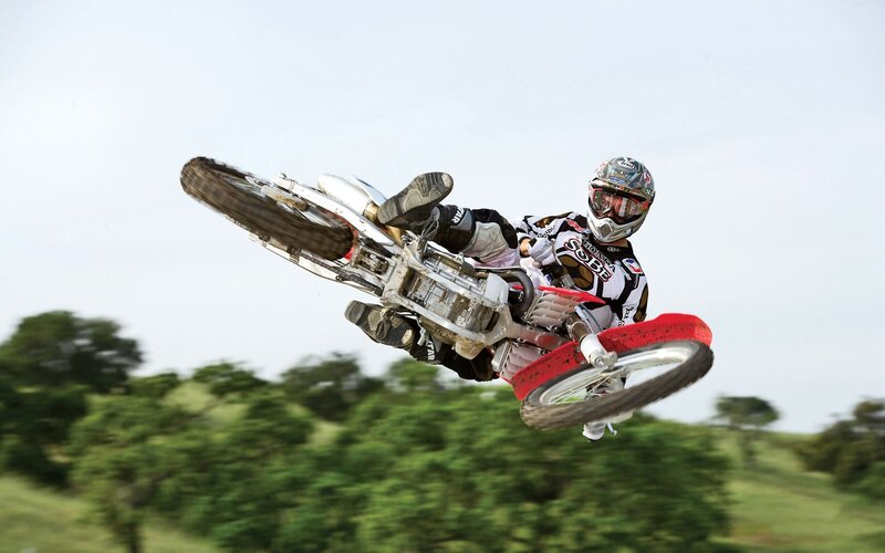 Motocross rider in mid-air jump