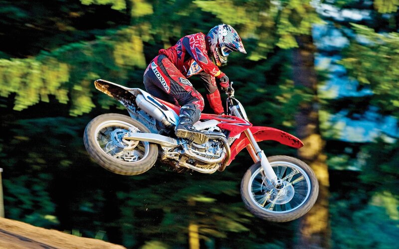 Motocross rider in mid-air jump