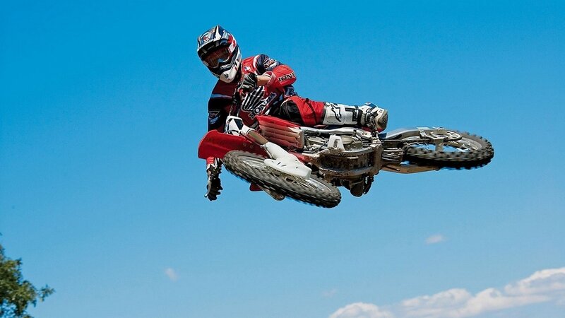 Motocross rider in mid-air jump