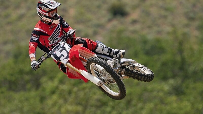 Motocross rider in mid-air jump