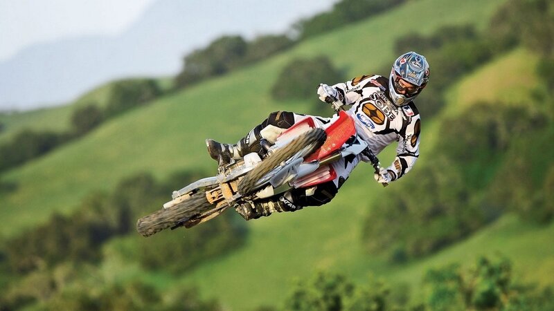 Motocross rider in mid-air jump