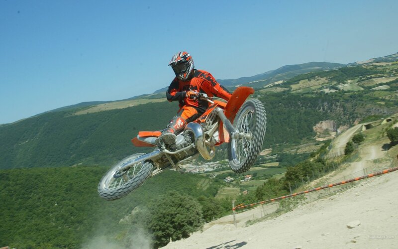 Motocross rider in mid-air jump