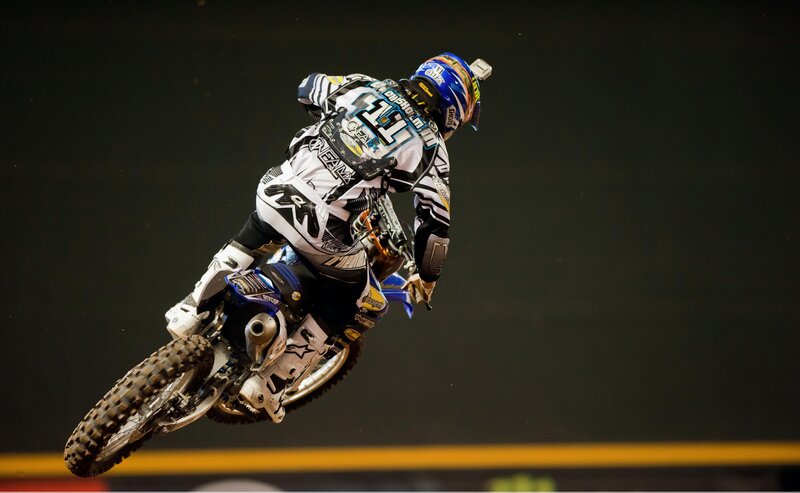 Motocross rider in mid-air jump
