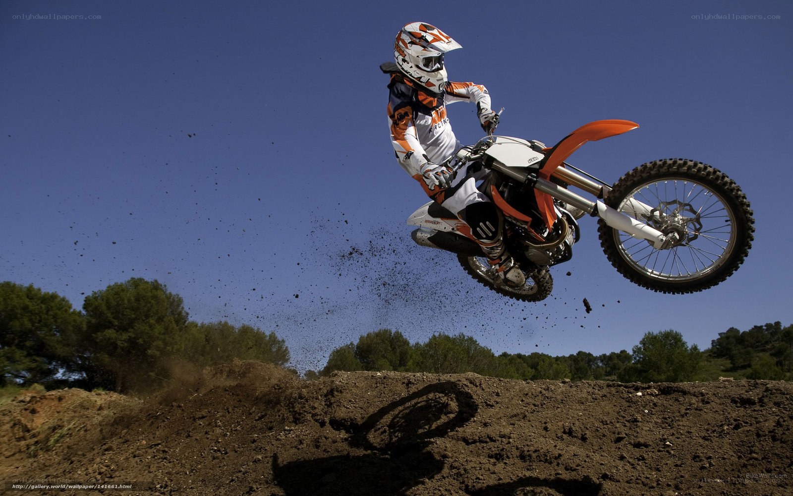 Motocross rider in mid-air jump