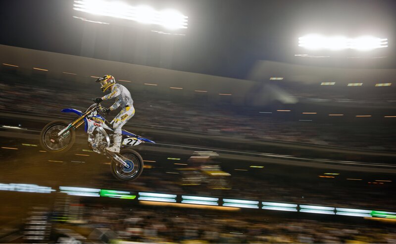 Motocross rider in mid-air jump