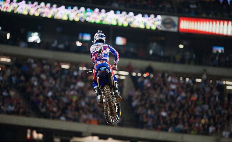 Motocross rider in mid-air jump