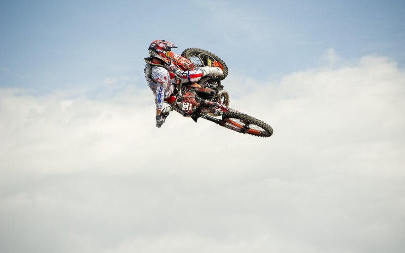 Motocross rider in mid-air jump