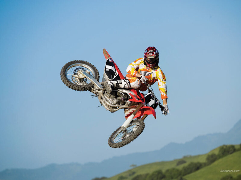 Motocross rider in mid-air jump
