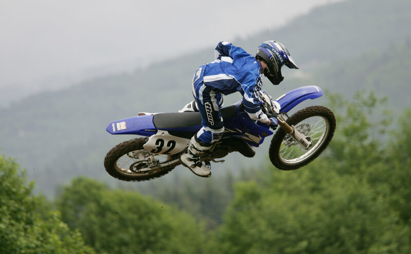Motocross rider in mid-air jump