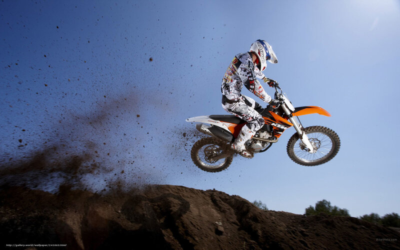 Motocross rider in mid-air jump