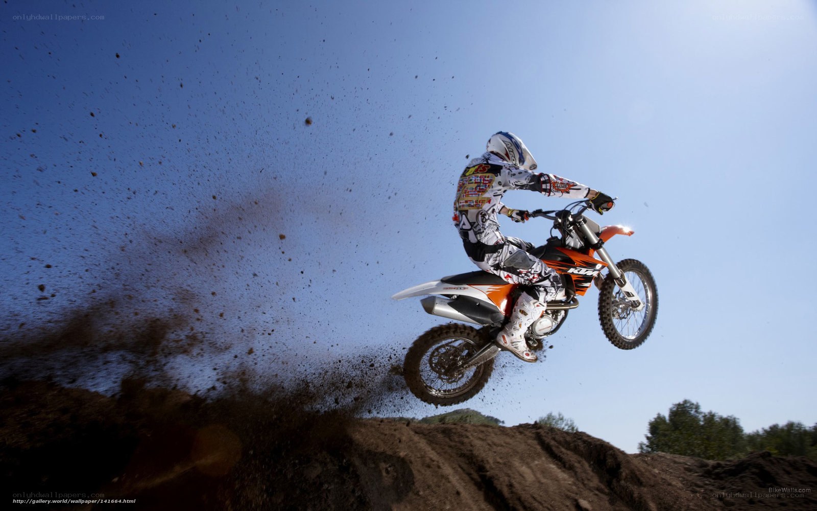 Motocross rider in mid-air jump