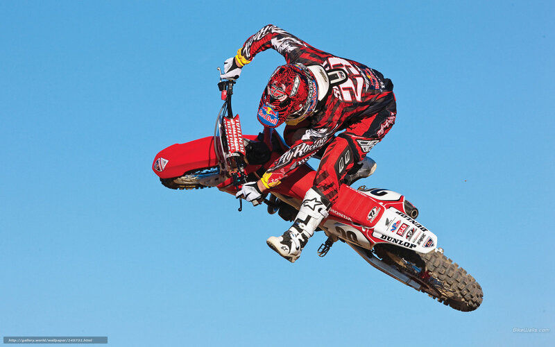 Motocross rider in mid-air jump