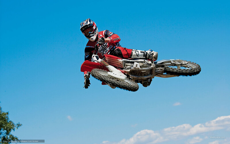 Motocross rider in mid-air jump