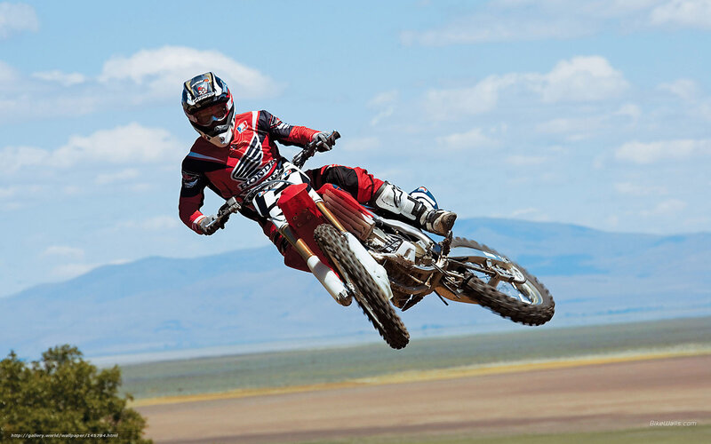 Motocross rider in mid-air jump