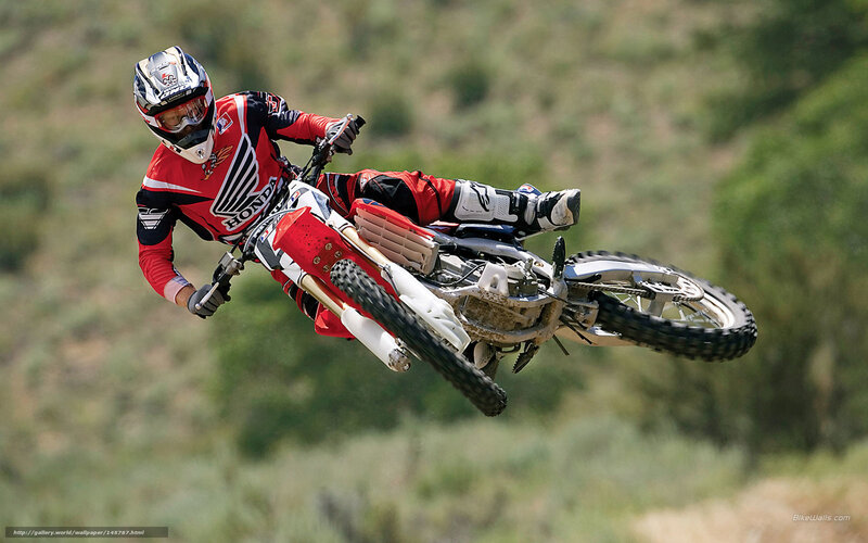 Motocross rider in mid-air jump