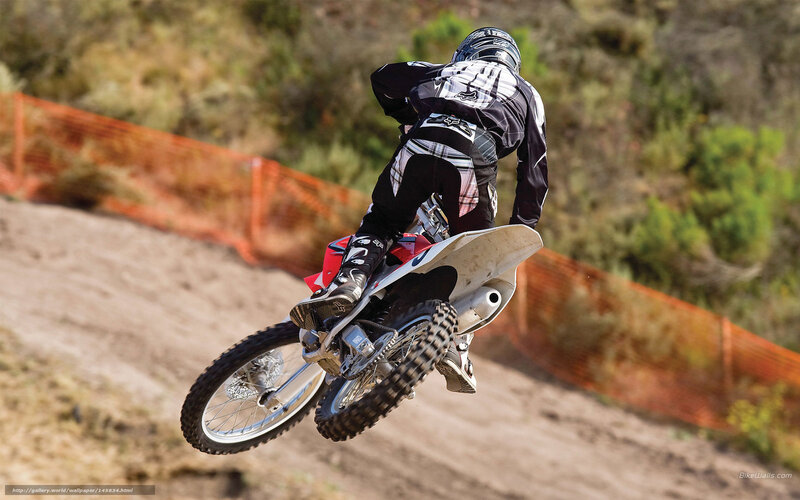 Motocross rider in mid-air jump