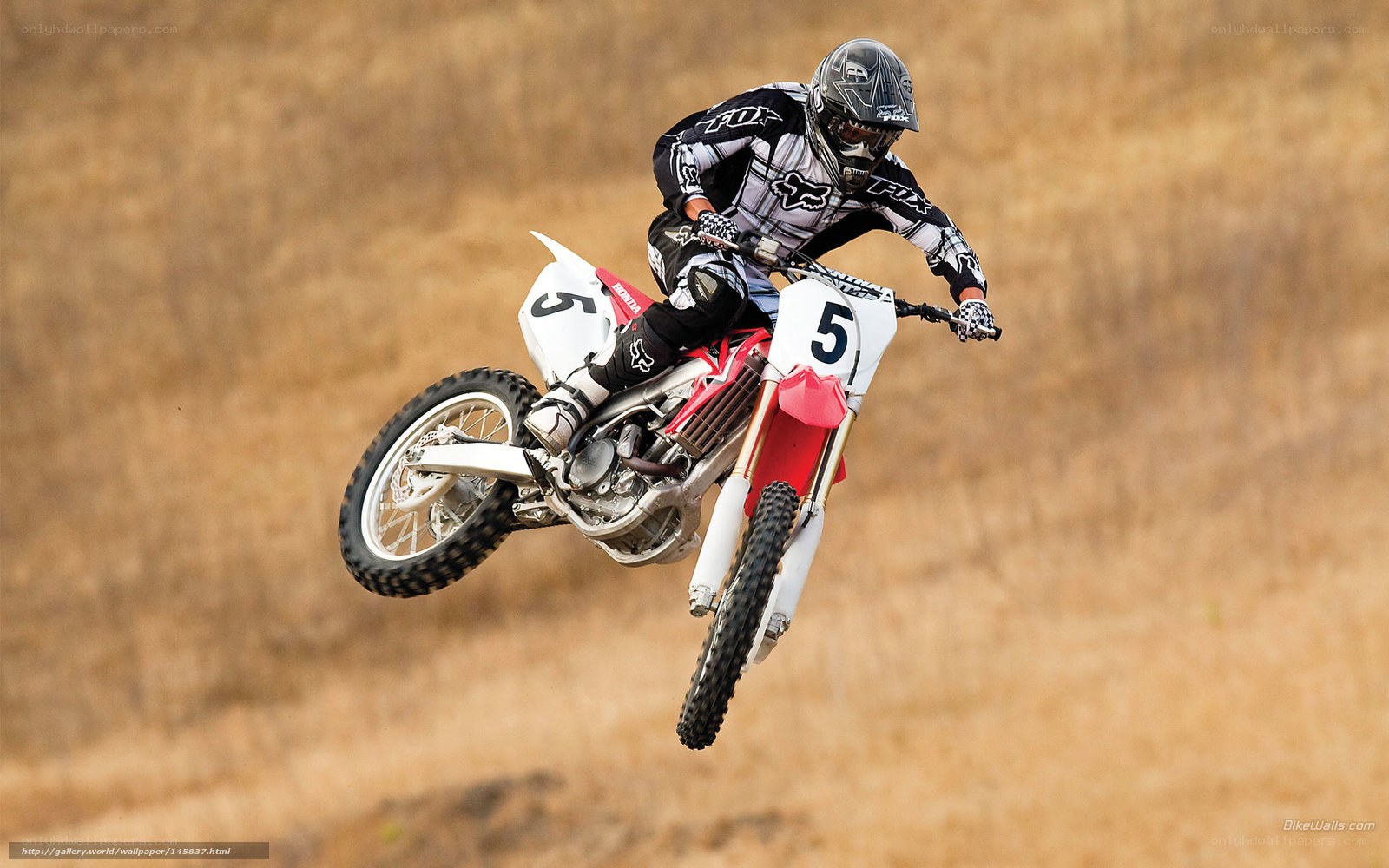 Motocross rider in mid-air jump