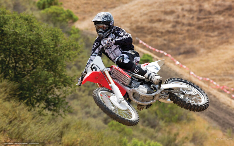 Motocross rider in mid-air jump