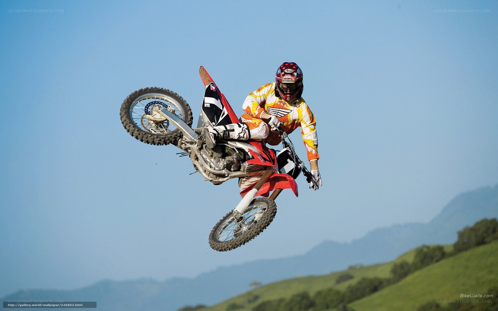 Motocross rider in mid-air jump
