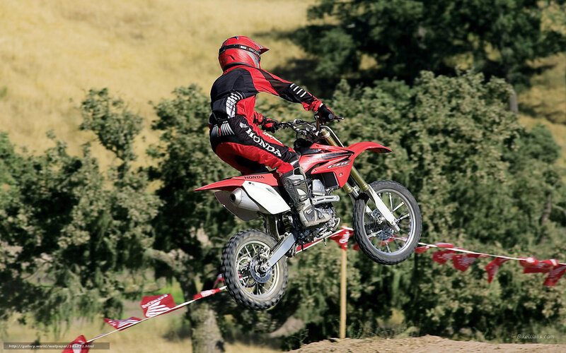 Motocross rider in mid-air jump