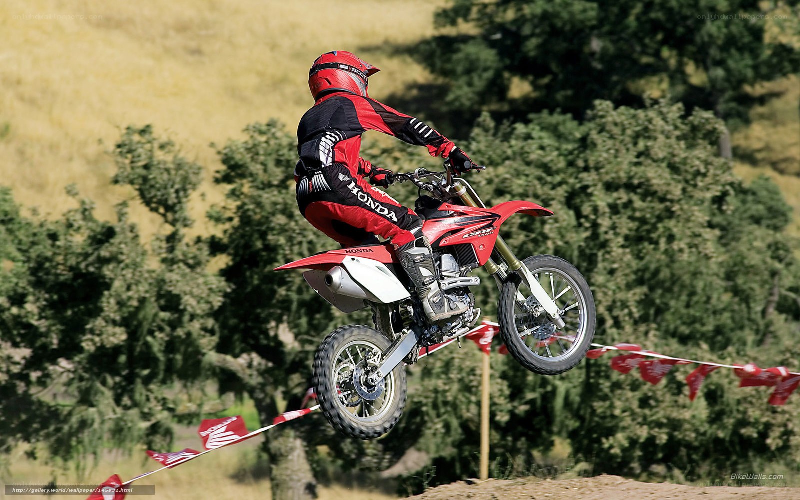 Motocross rider in mid-air jump