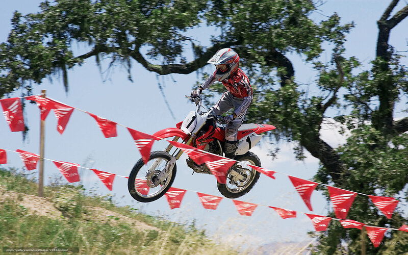 Motocross rider in mid-air jump