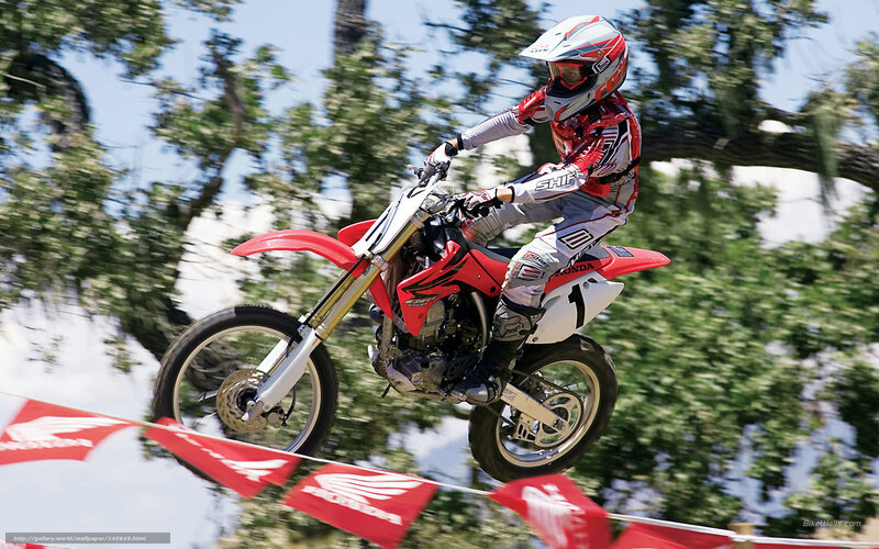 Motocross rider in mid-air jump