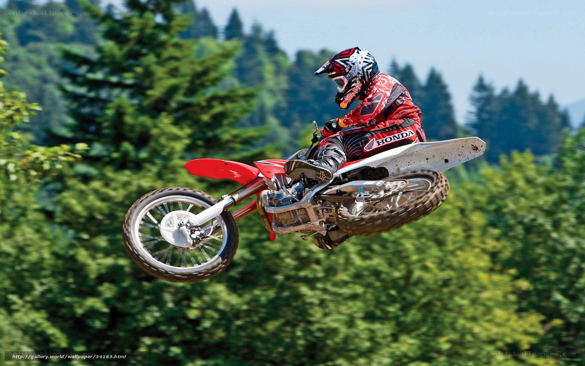 Motocross rider in mid-air jump