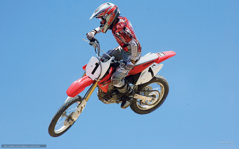 Motocross rider in mid-air jump