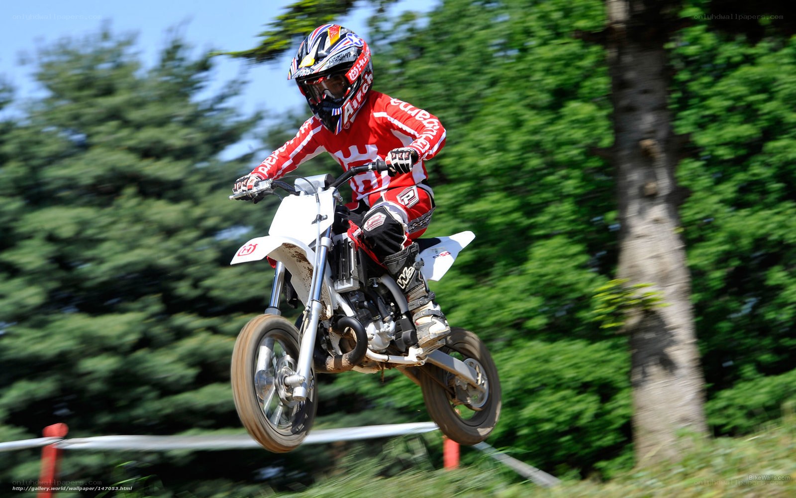Motocross rider in mid-air jump