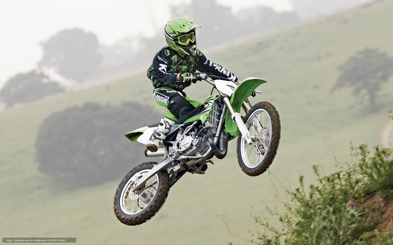 Motocross rider in mid-air jump