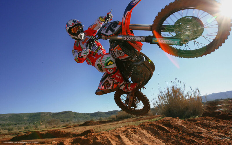Motocross rider in mid-air jump