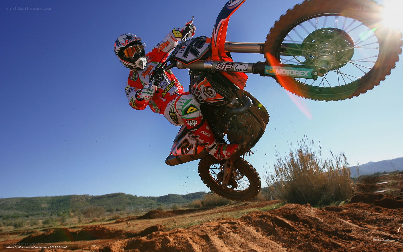 Motocross rider in mid-air jump